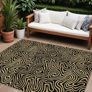 Photo of Black And Beige Abstract Washable Indoor Outdoor Area Rug