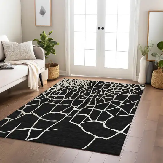Black And Beige Abstract Washable Indoor Outdoor Area Rug Photo 9