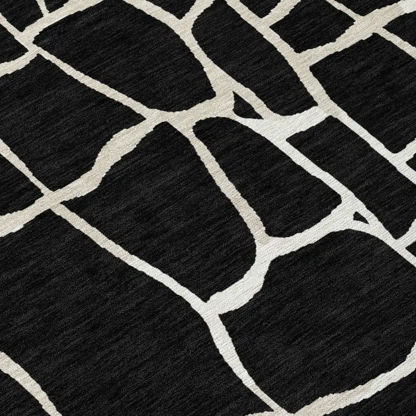 Black And Beige Abstract Washable Indoor Outdoor Area Rug Photo 4