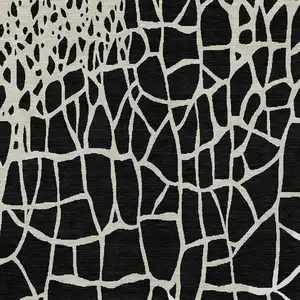 Photo of Black And Beige Abstract Washable Indoor Outdoor Area Rug