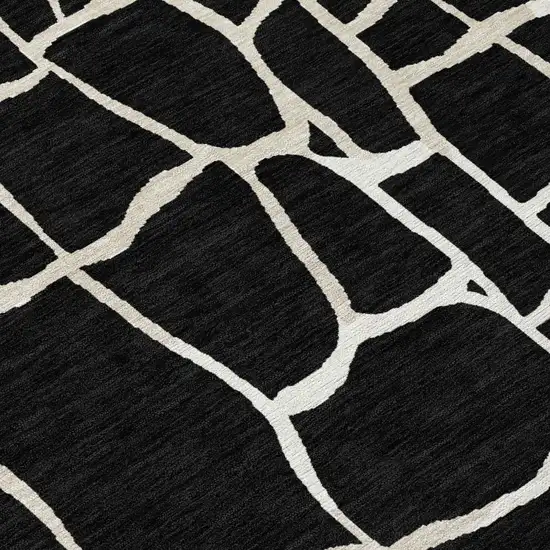 Black And Beige Abstract Washable Indoor Outdoor Area Rug Photo 4
