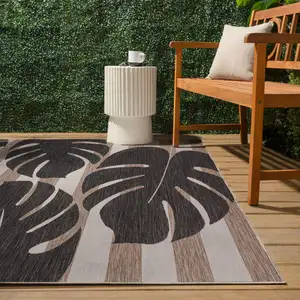 Photo of Black And Beige Floral Indoor Outdoor Area Rug