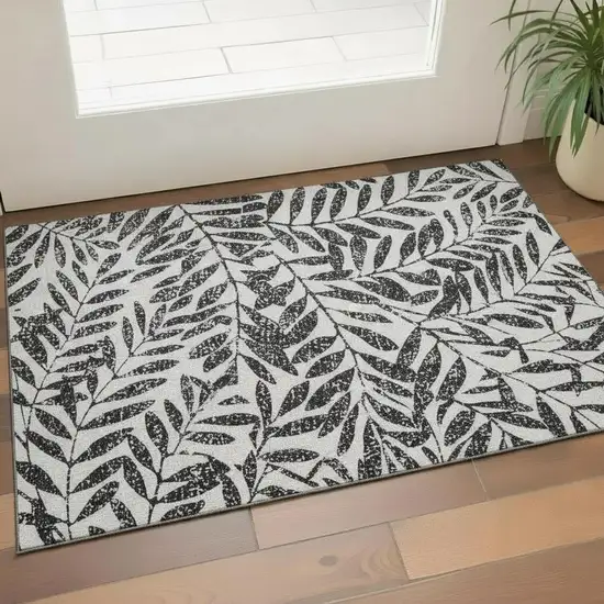 Black And Beige Floral Washable Area Rug With UV Protection Photo 1