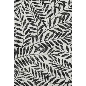 Photo of Black And Beige Floral Washable Area Rug With UV Protection