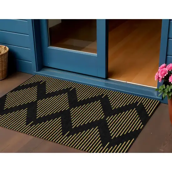 Black And Beige Geometric Washable Indoor Outdoor Area Rug Photo 1