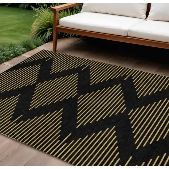 Black And Beige Geometric Washable Indoor Outdoor Area Rug Photo 1
