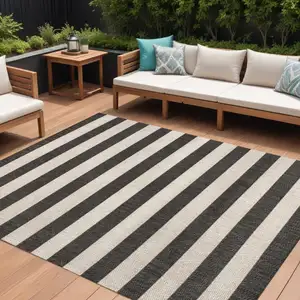 Photo of Black And Beige Striped Indoor Outdoor Area Rug