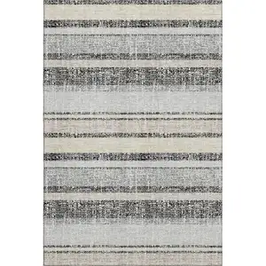 Photo of Black And Beige Striped Washable Area Rug With UV Protection