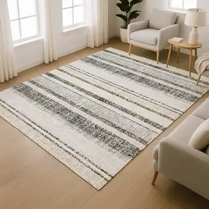Photo of Black And Beige Striped Washable Area Rug With UV Protection