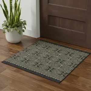 Photo of Black And Brown Tribal Square Rug