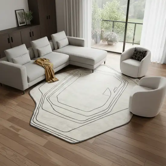 Black And Cream Abstract Area Rug Photo 1