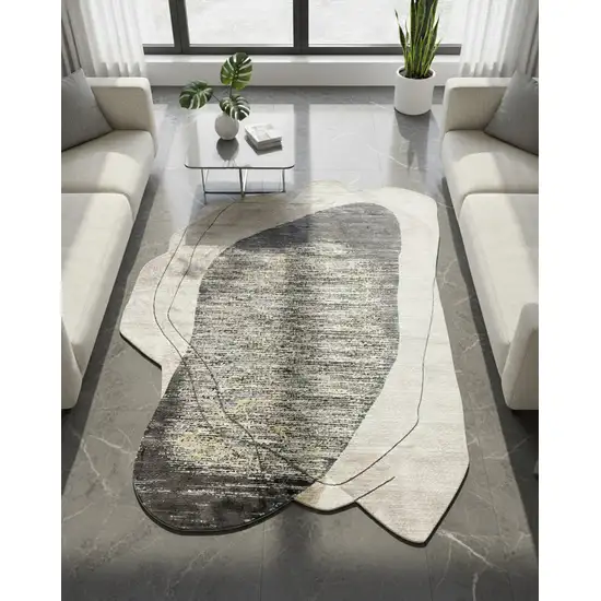Black And Cream Abstract Distressed Area Rug Photo 1