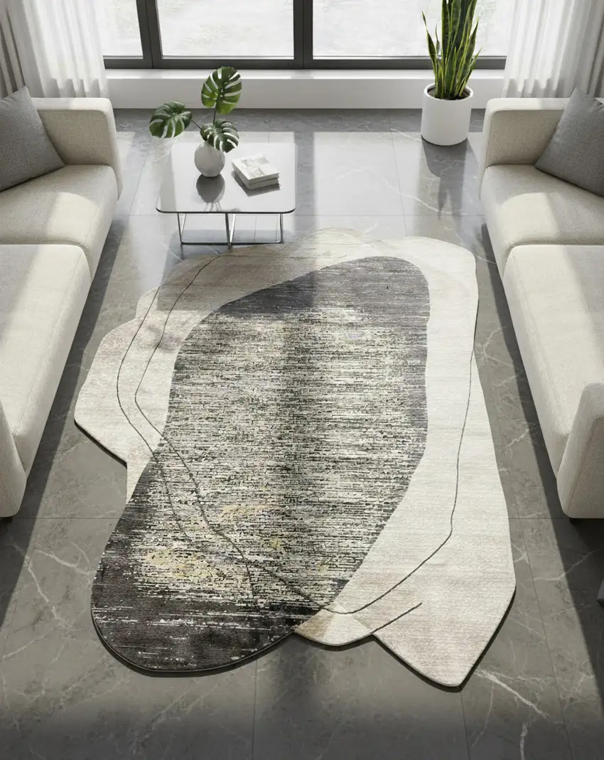 Black And Cream Abstract Distressed Area Rug Photo 1