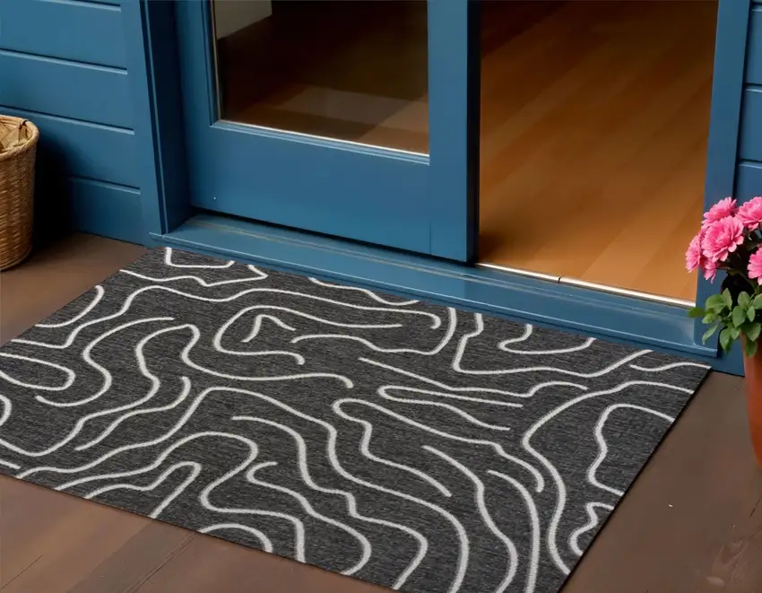 Black And Cream Abstract Indoor Outdoor Area Rug Photo 1