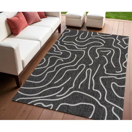Black And Cream Abstract Indoor Outdoor Area Rug Photo 1