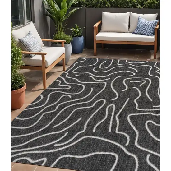 Black And Cream Abstract Indoor Outdoor Area Rug Photo 1