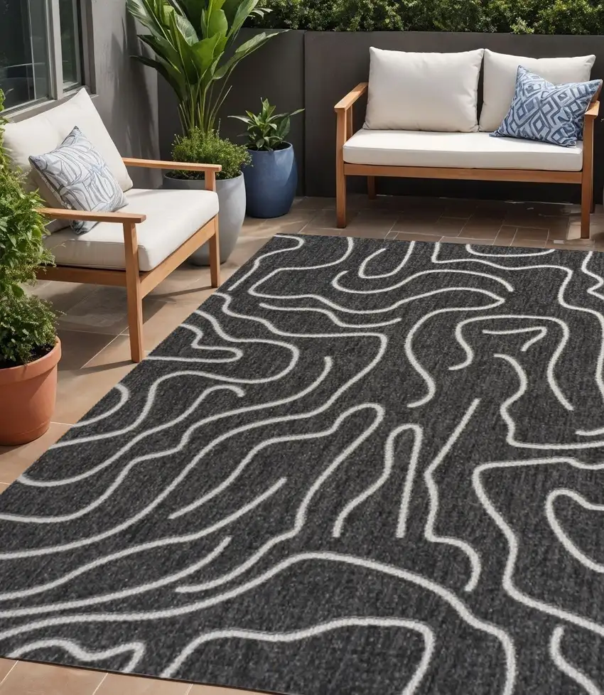 Black And Cream Abstract Indoor Outdoor Area Rug Photo 1