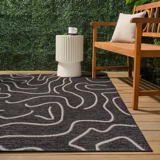 Black And Cream Abstract Indoor Outdoor Area Rug Photo 8