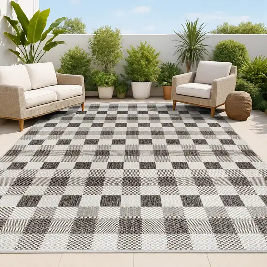 Black And Cream Geometric Indoor Outdoor Area Rug Photo 4