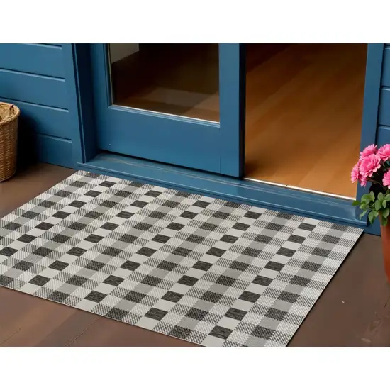 Black And Cream Geometric Indoor Outdoor Area Rug Photo 1