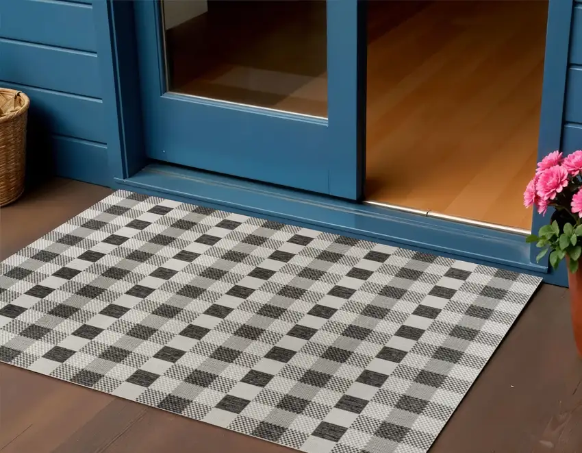 Black And Cream Geometric Indoor Outdoor Area Rug Photo 1