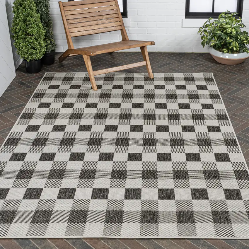 Black And Cream Geometric Indoor Outdoor Area Rug Photo 9