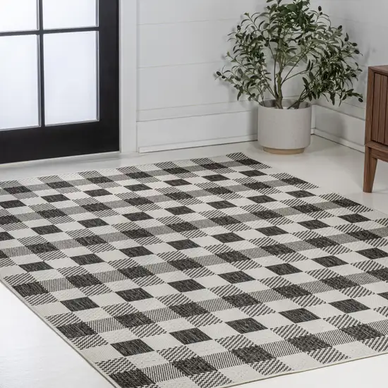Black And Cream Geometric Indoor Outdoor Area Rug Photo 7