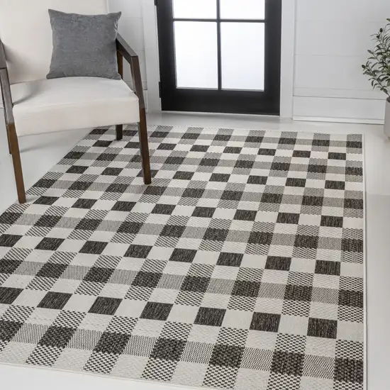 Black And Cream Geometric Indoor Outdoor Area Rug Photo 4
