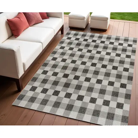 Black And Cream Geometric Indoor Outdoor Area Rug Photo 1
