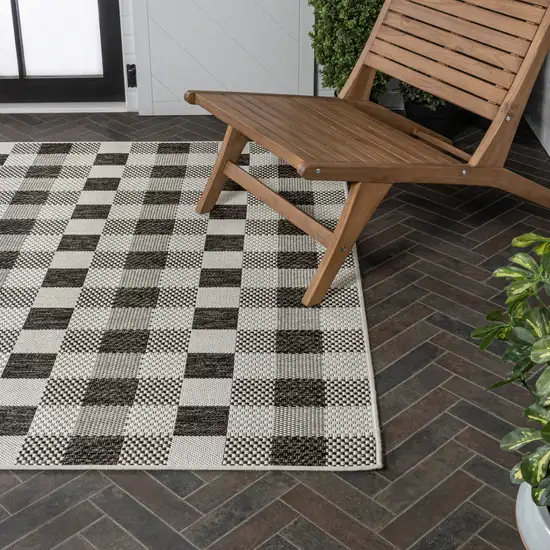 Black And Cream Geometric Indoor Outdoor Area Rug Photo 9