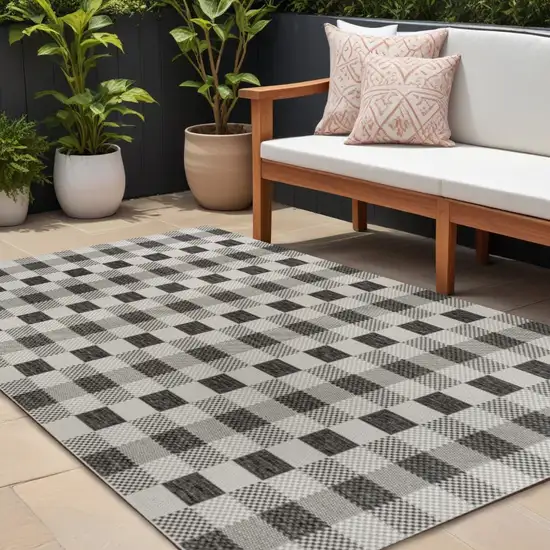 Black And Cream Geometric Indoor Outdoor Area Rug Photo 1