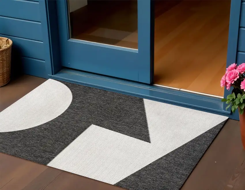 Black And Cream Geometric Indoor Outdoor Area Rug Photo 1