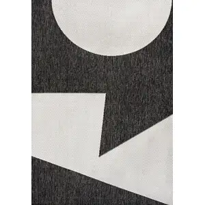 Photo of Black And Cream Geometric Indoor Outdoor Area Rug
