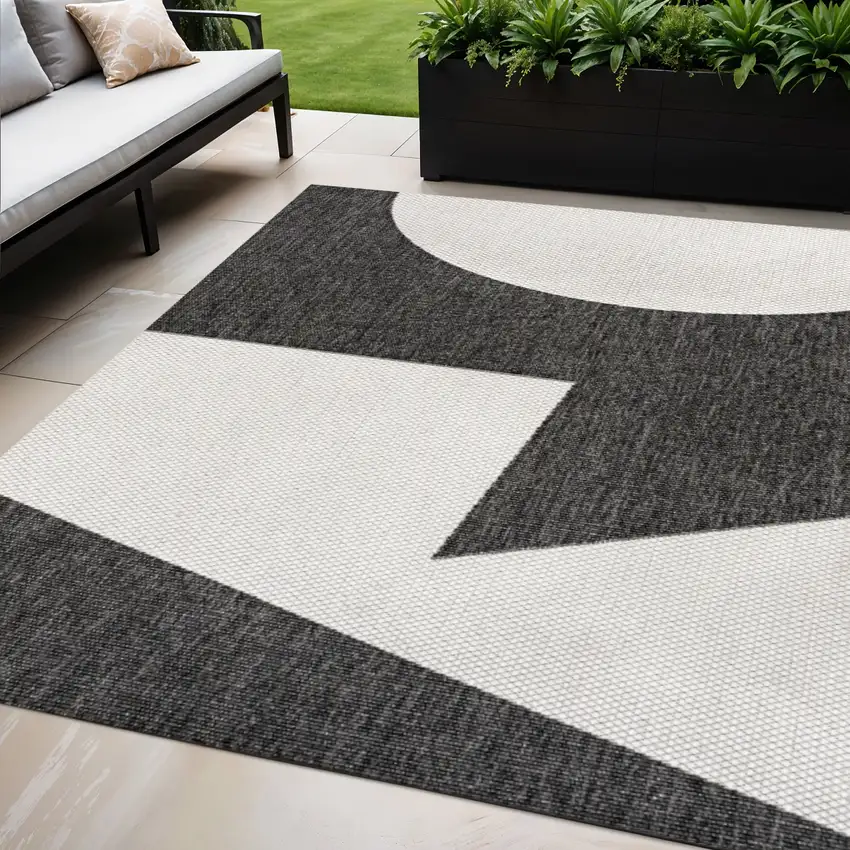 Black And Cream Geometric Indoor Outdoor Area Rug Photo 1