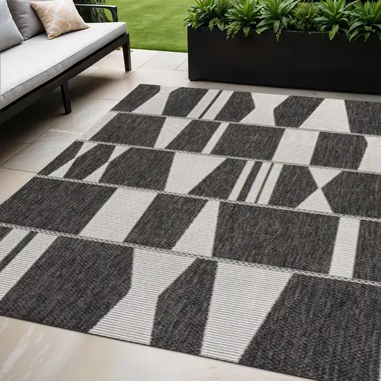 Black And Cream Geometric Indoor Outdoor Area Rug Photo 1