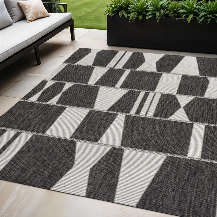 Black And Cream Geometric Indoor Outdoor Area Rug Photo 1