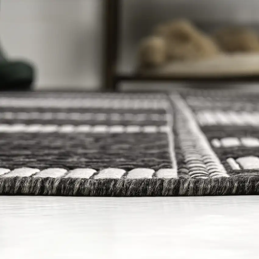 Black And Cream Geometric Indoor Outdoor Area Rug Photo 9