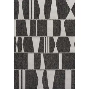 Photo of Black And Cream Geometric Indoor Outdoor Area Rug