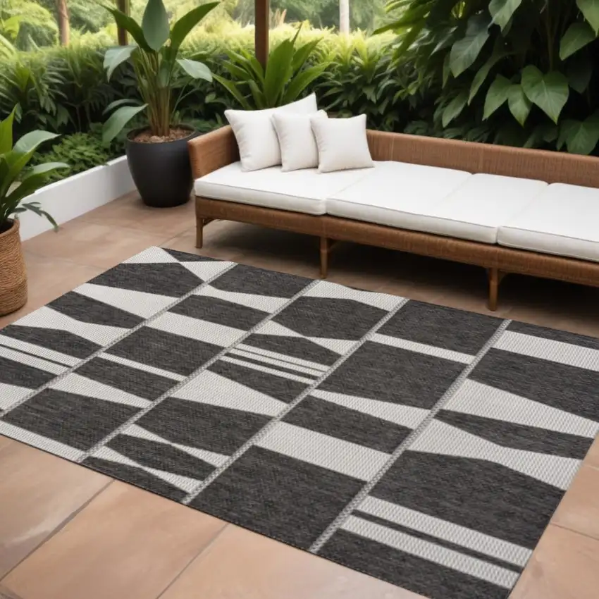 Black And Cream Geometric Indoor Outdoor Area Rug Photo 1