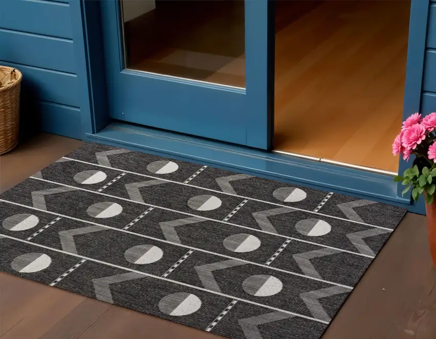 Black And Cream Geometric Indoor Outdoor Area Rug Photo 1