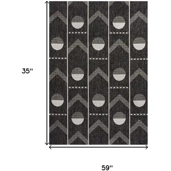 Black And Cream Geometric Indoor Outdoor Area Rug Photo 9