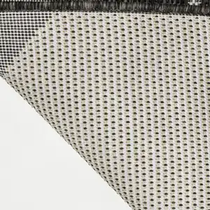 Photo of Black And Cream Geometric Indoor Outdoor Area Rug