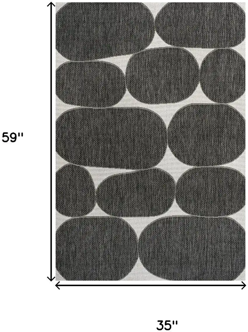 Black And Cream Geometric Indoor Outdoor Area Rug Photo 5