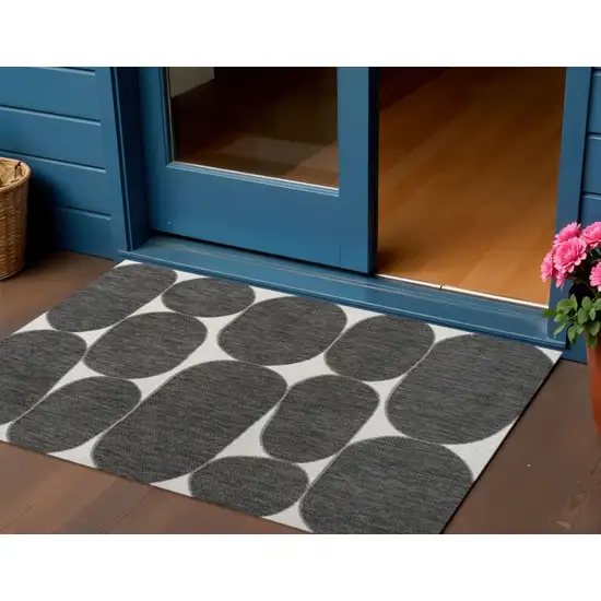 Black And Cream Geometric Indoor Outdoor Area Rug Photo 1