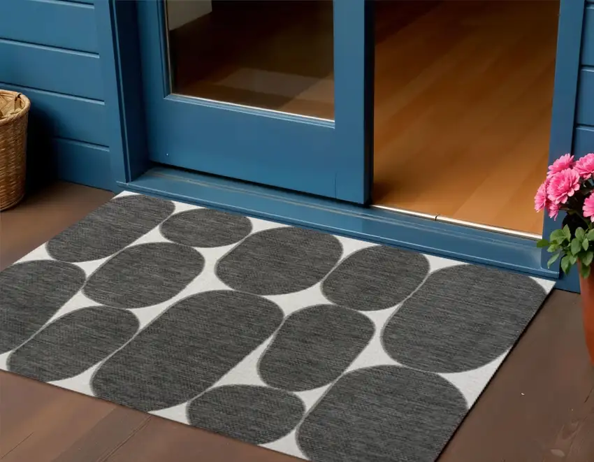 Black And Cream Geometric Indoor Outdoor Area Rug Photo 1