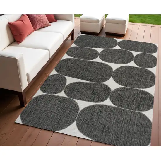 Black And Cream Geometric Indoor Outdoor Area Rug Photo 1