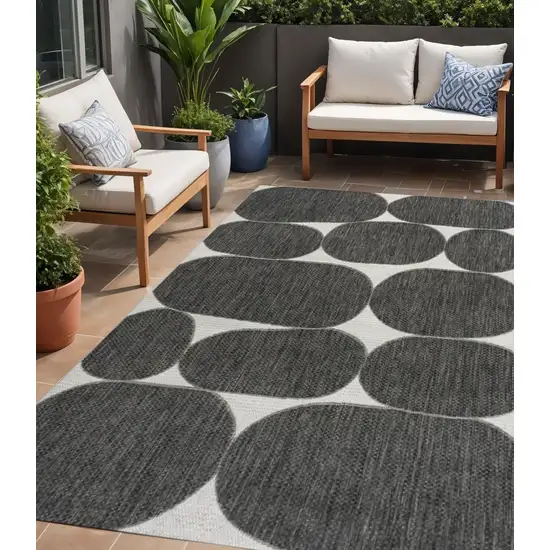 Black And Cream Geometric Indoor Outdoor Area Rug Photo 1