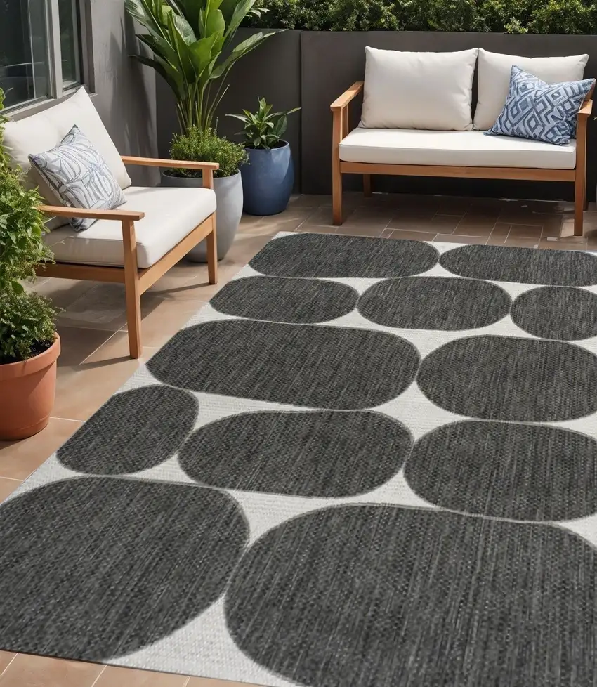 Black And Cream Geometric Indoor Outdoor Area Rug Photo 1