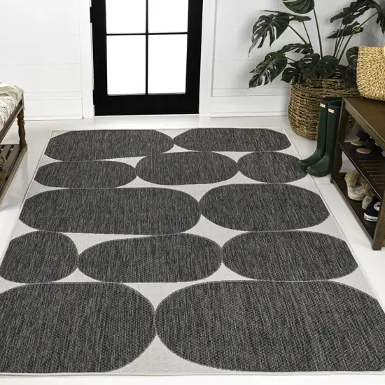 Black And Cream Geometric Indoor Outdoor Area Rug Photo 6