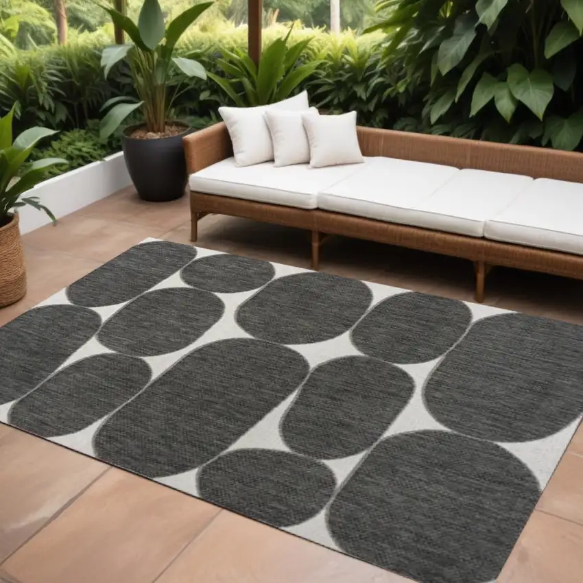 Black And Cream Geometric Indoor Outdoor Area Rug Photo 1
